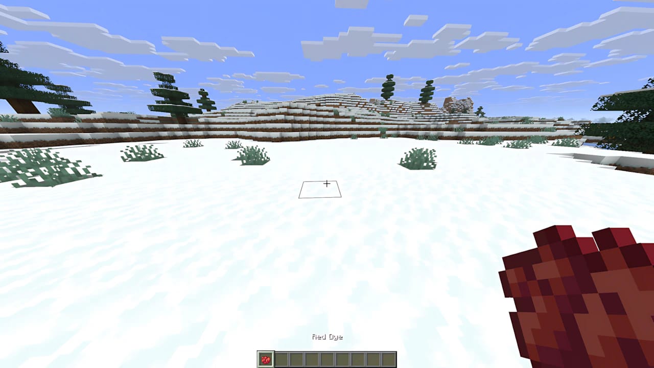 Minecraft character wearing red dyed leather armor in a snowy biome holding red dye items.
