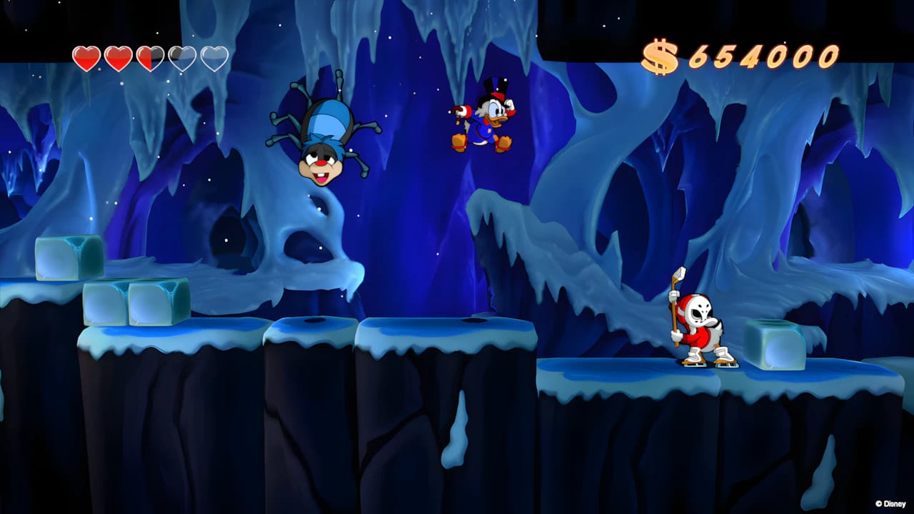 DuckTales Remastered gameplay showing Scrooge McDuck pogo jumping in Himalayas level, 2D HD sprites on 3D background.