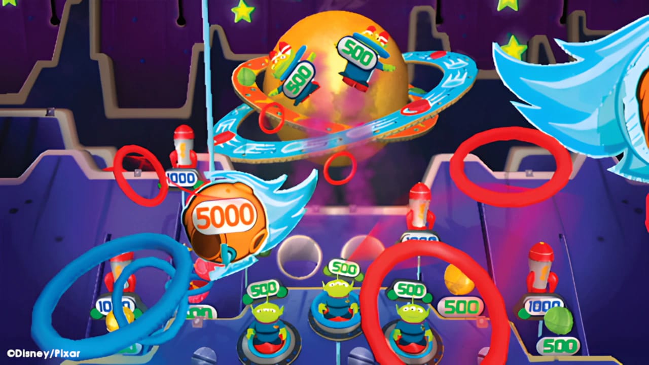 Toy Story Mania Ring Toss gameplay showing 3D rendering and pointer controls in high-resolution arcade mode.