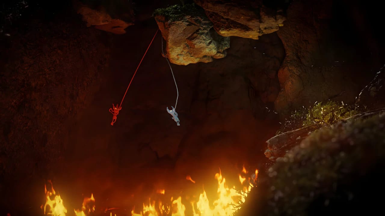 Unravel Two co-op gameplay showing Yarnys climbing a fire pit with 4K HDR lighting and physics-based mechanics.