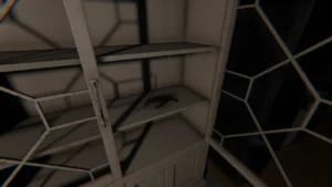 Monkey Paw cursed possession inside a wooden cabinet in Phasmophobia, high-resolution textures and dynamic lighting.