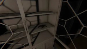 Monkey Paw cursed possession inside a wooden cabinet in Phasmophobia, high-resolution textures and dynamic lighting.