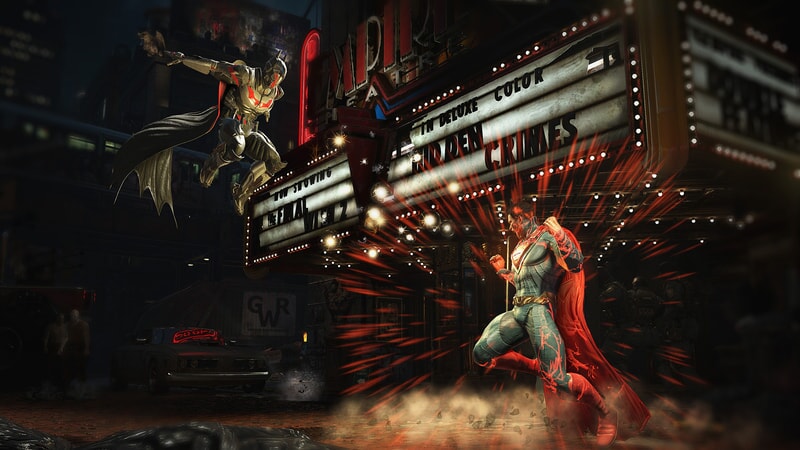 Batman and Superman engaged in a dramatic fight scene at the Empire Theater in Injustice 2.